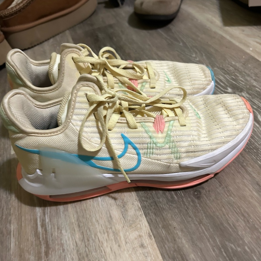 Nike Athletic Shoes in Cream, Blue, and Pink